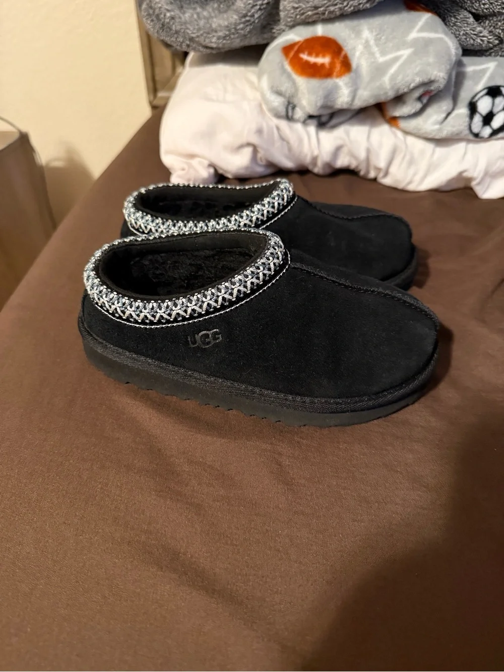 UGG Black Suede Slip-On Shearling Clog with Braided Trim